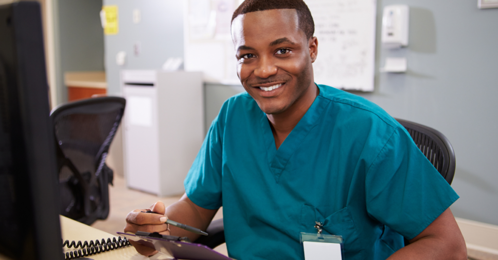 electronic medical records nursing man smiling on screen