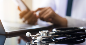 emr in the philippines in the phone in the hand of a doctor