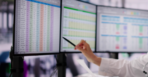 medical software billing on screen with a doctor pointing to it